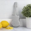 Râpe Guitare, Kikkerland